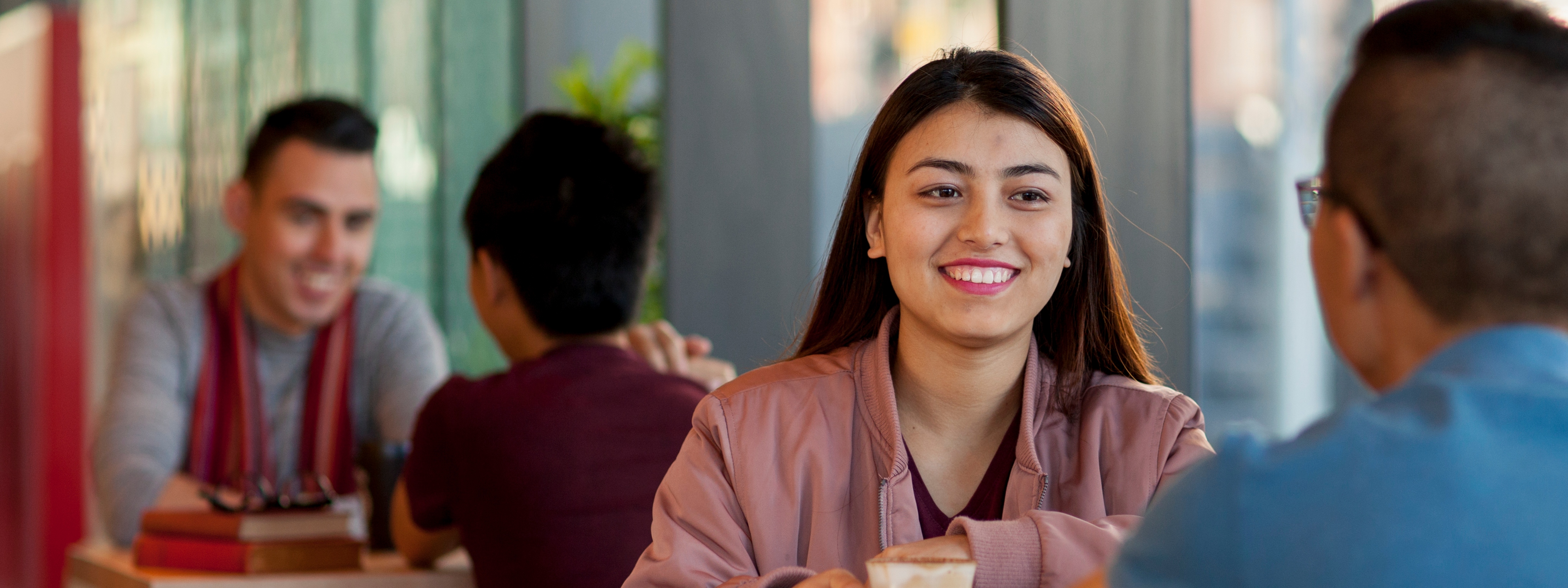 students talking on campus